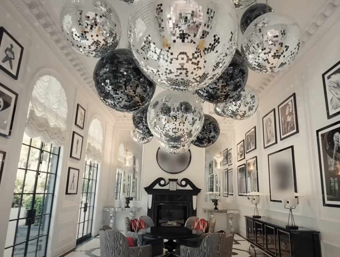 Disco balls hanging from the ceiling in a large room