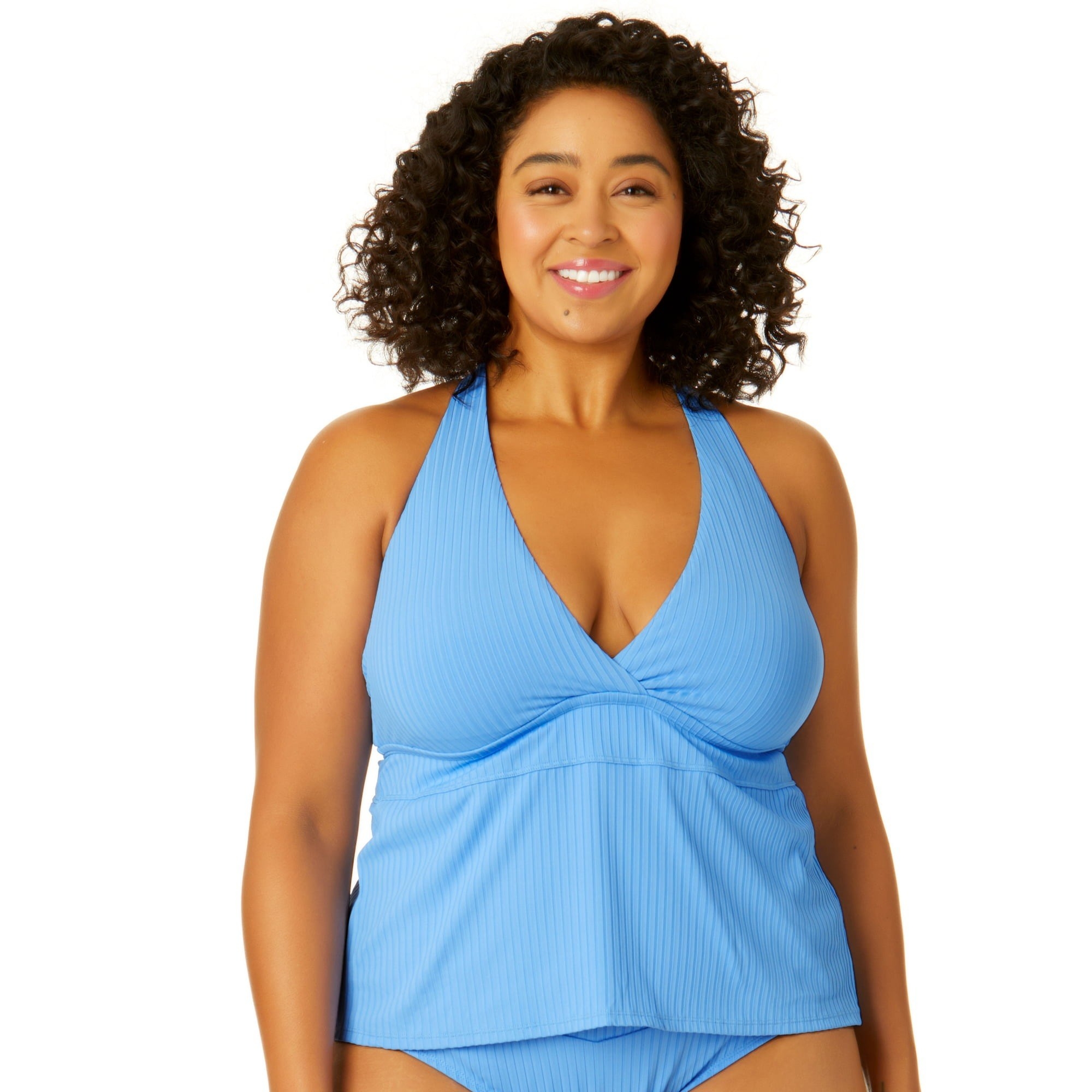 Model wearing ribbed blue tankini top with matching bottoms