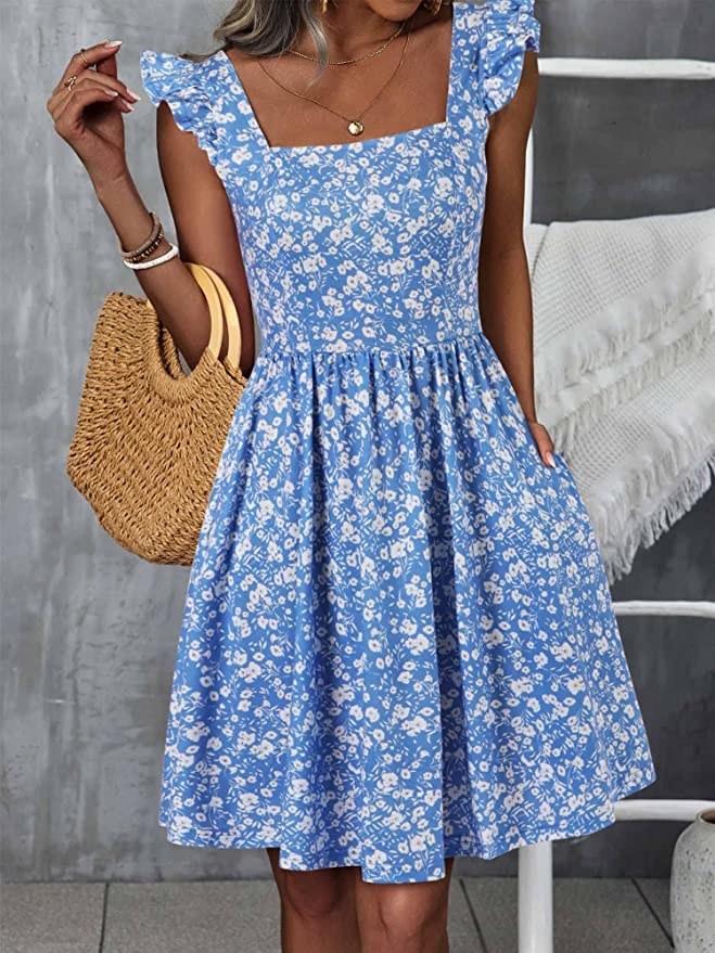 the blue floral knee-length dress