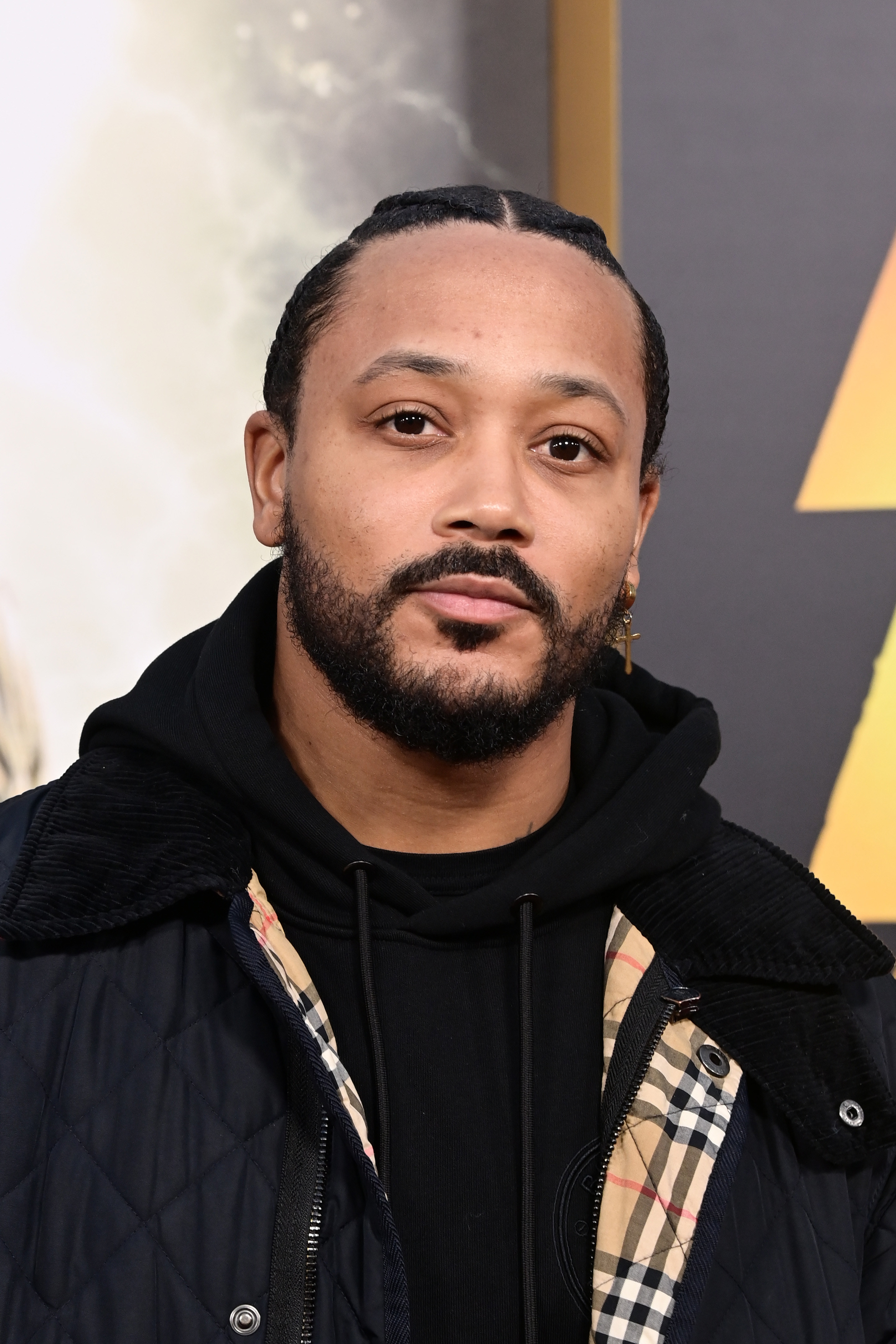 Romeo Miller arrives at the &quot;Shazam! Fury Of The Gods&quot; premiere on March 14, 2023