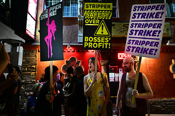 Supporters join strippes in a protest outside the Star Garden Topless Dive Bar in North Hollywood.