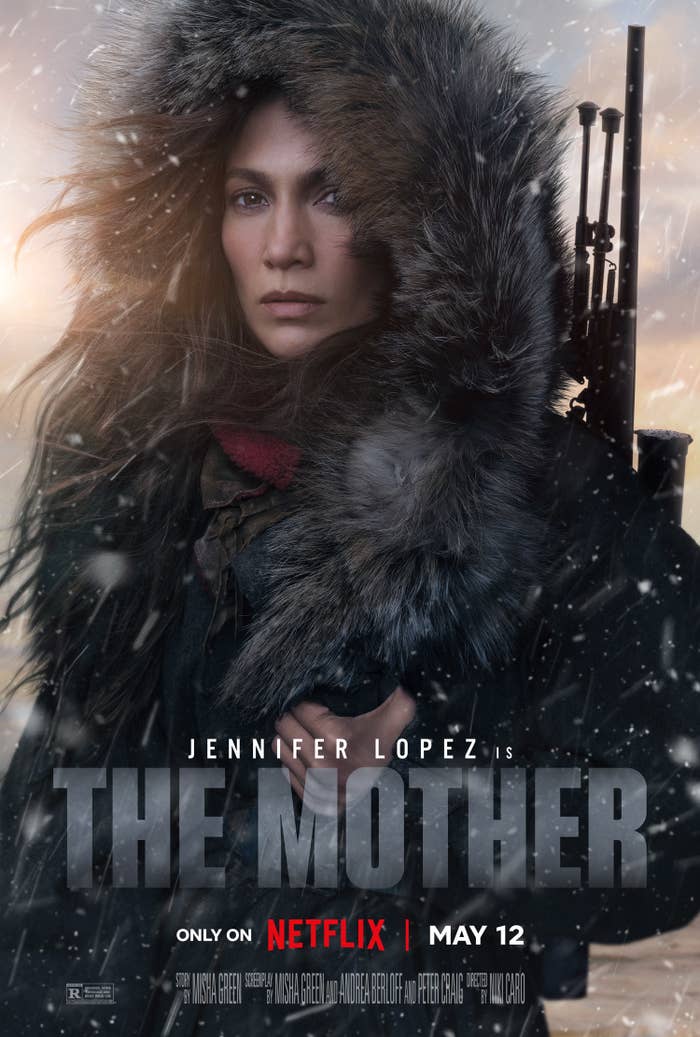 The poster for The Mother showing a closeup of Jennifer Lopez in a fur coat and carrying a weapon on her back