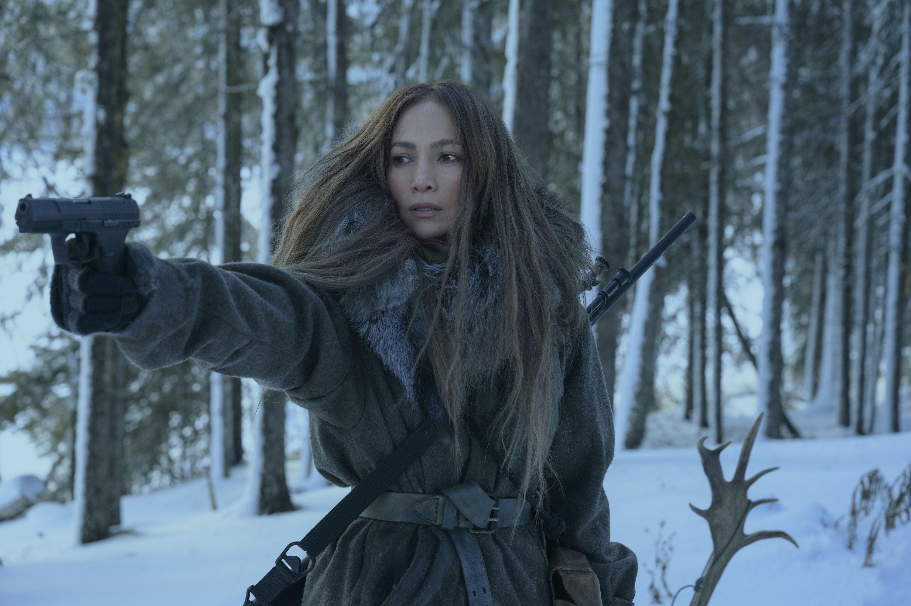 jennifer lopez holding a gun in the mother