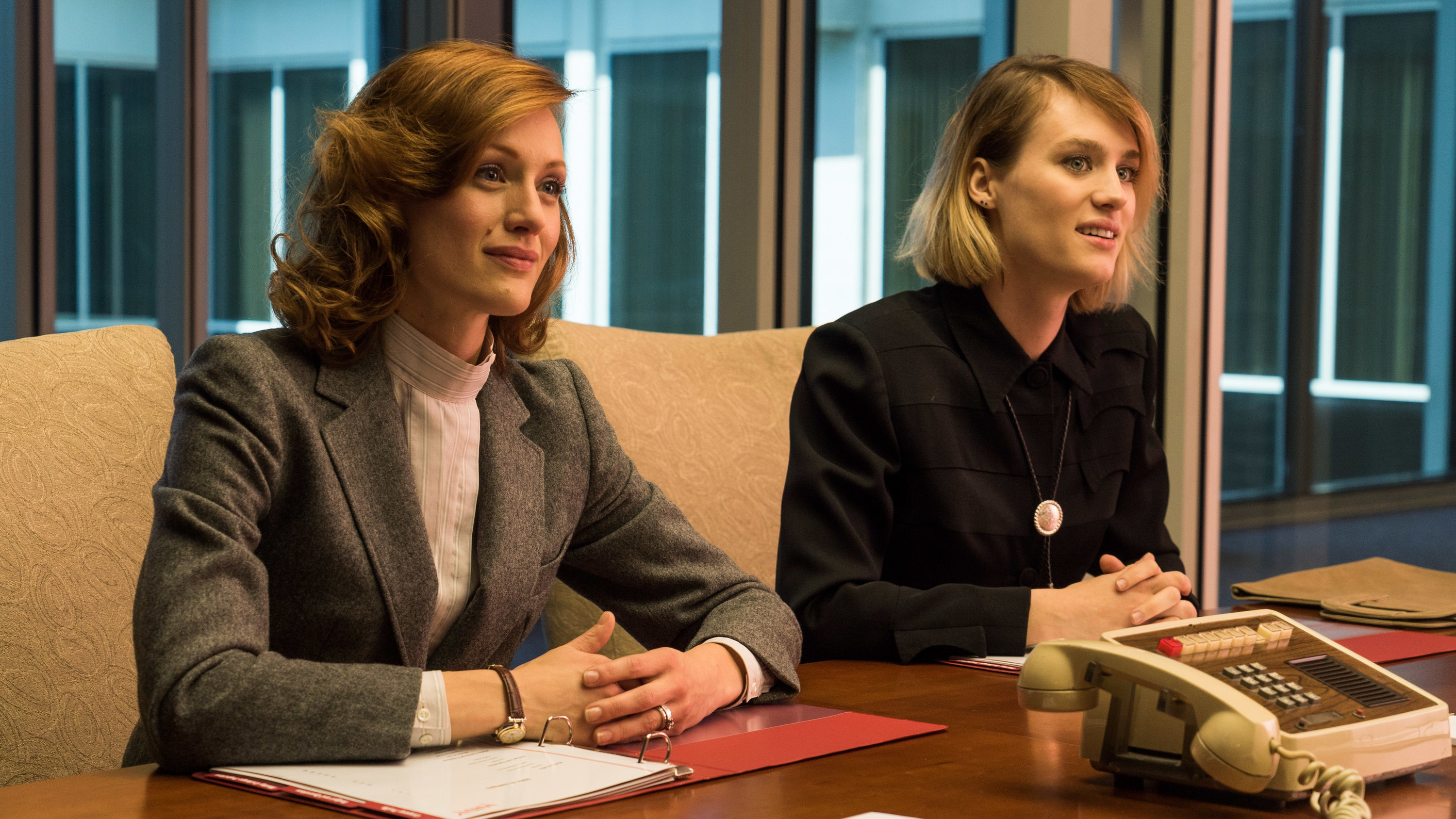 two women in a conference table