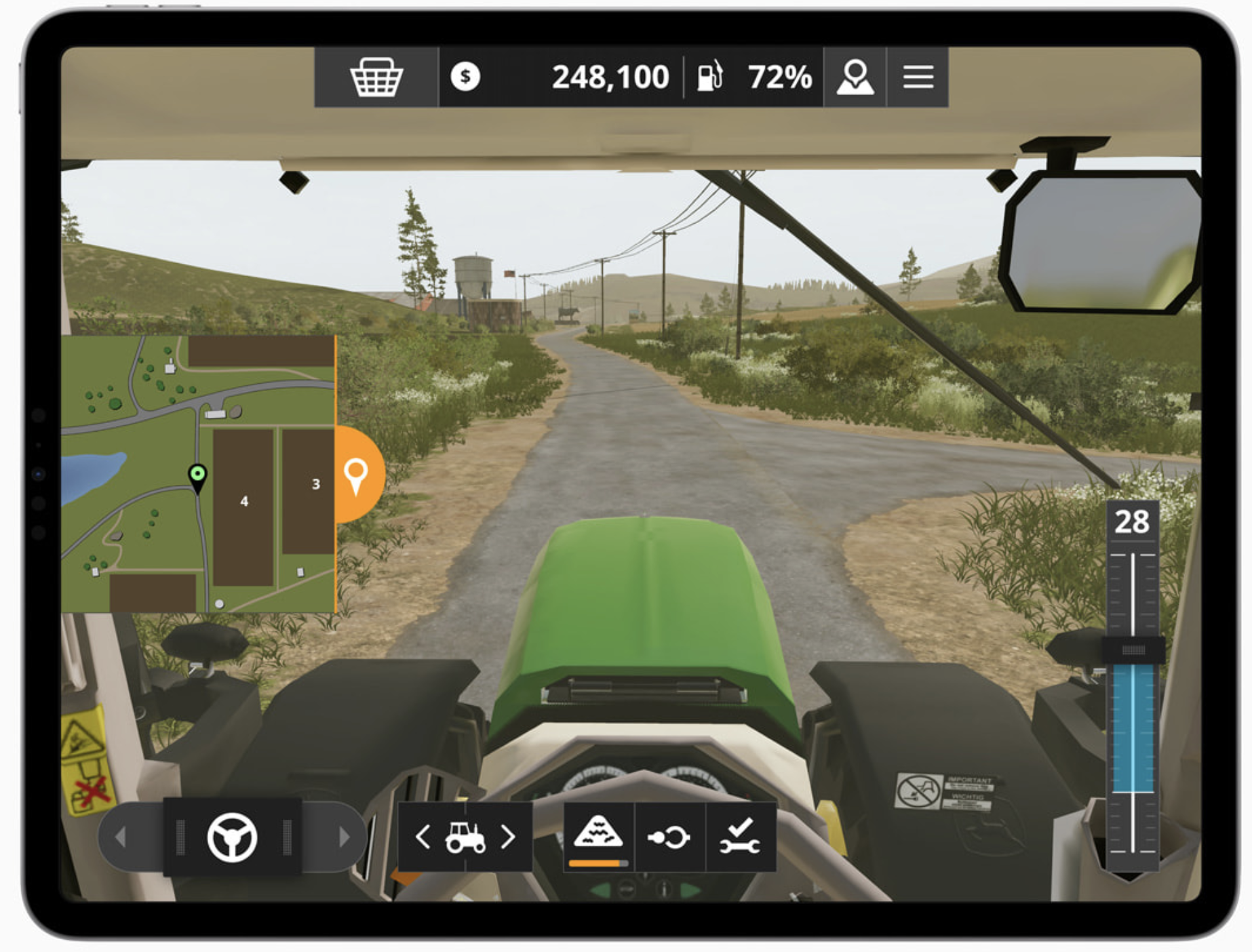 The POV from the cab of a tractor in &quot;Farming Simulator 20+&quot;
