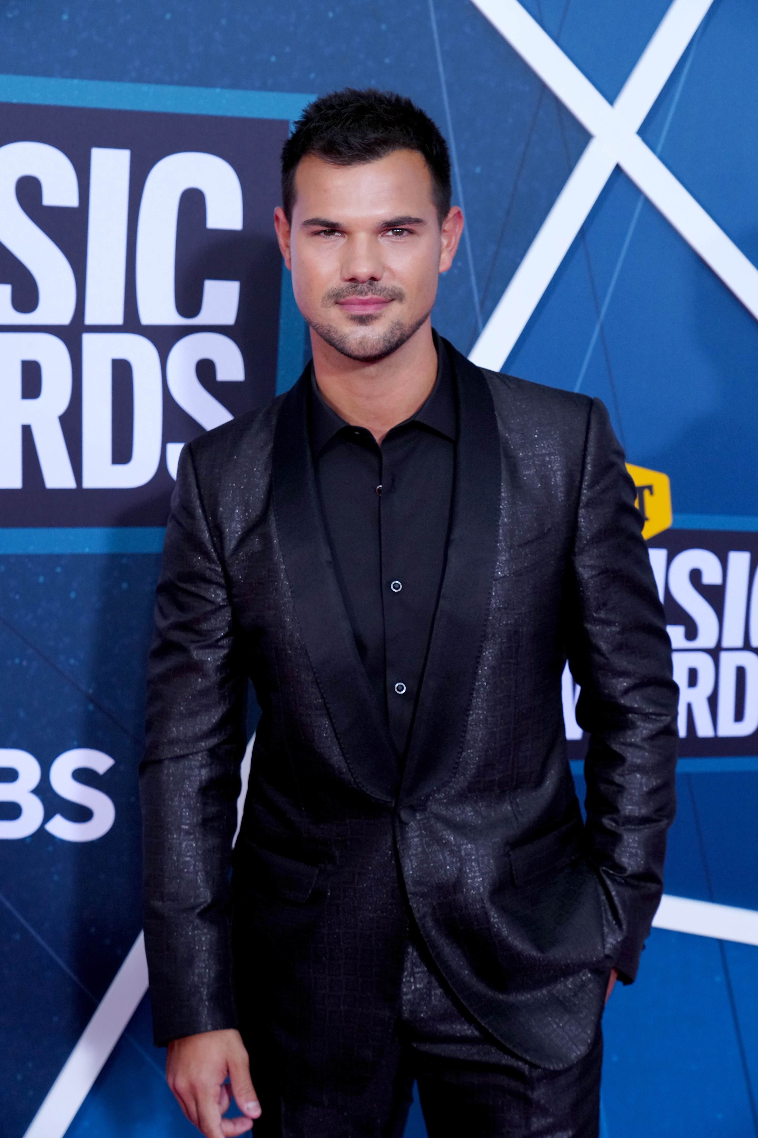 Lautner in a suit