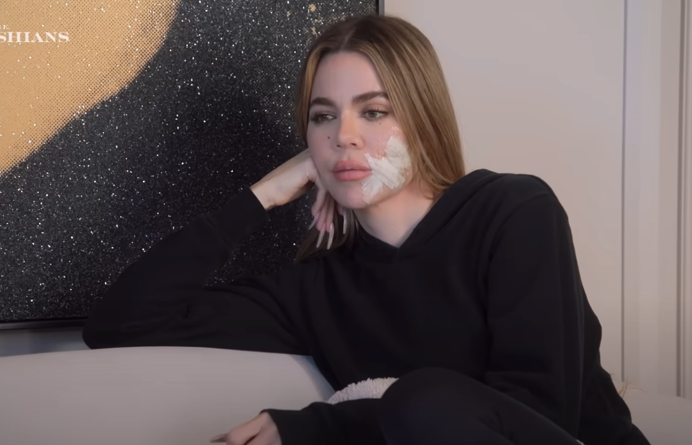 Khloé with a bandage on her face