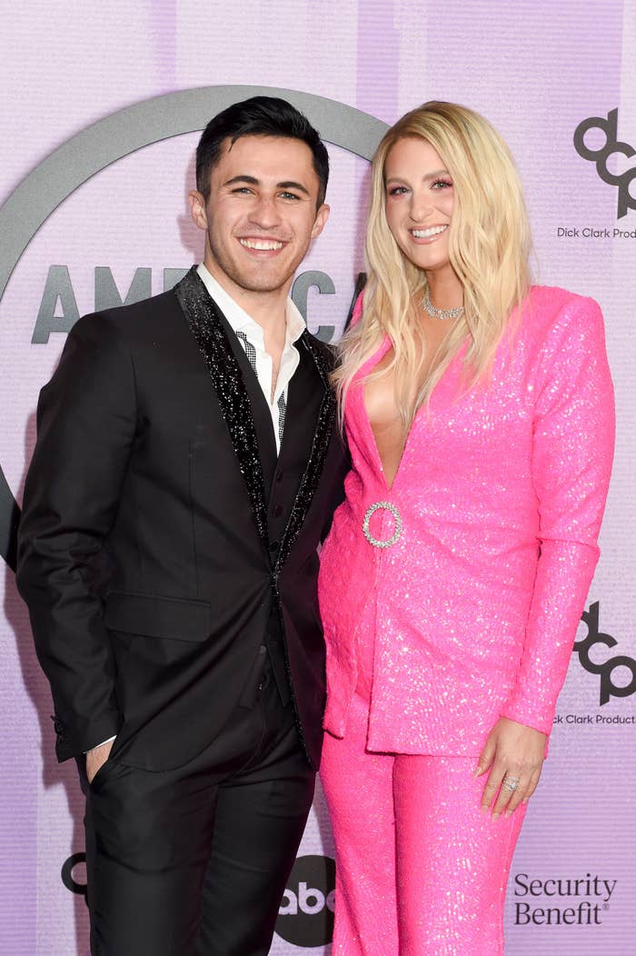 Chris and Megan pose together at a red carpet event