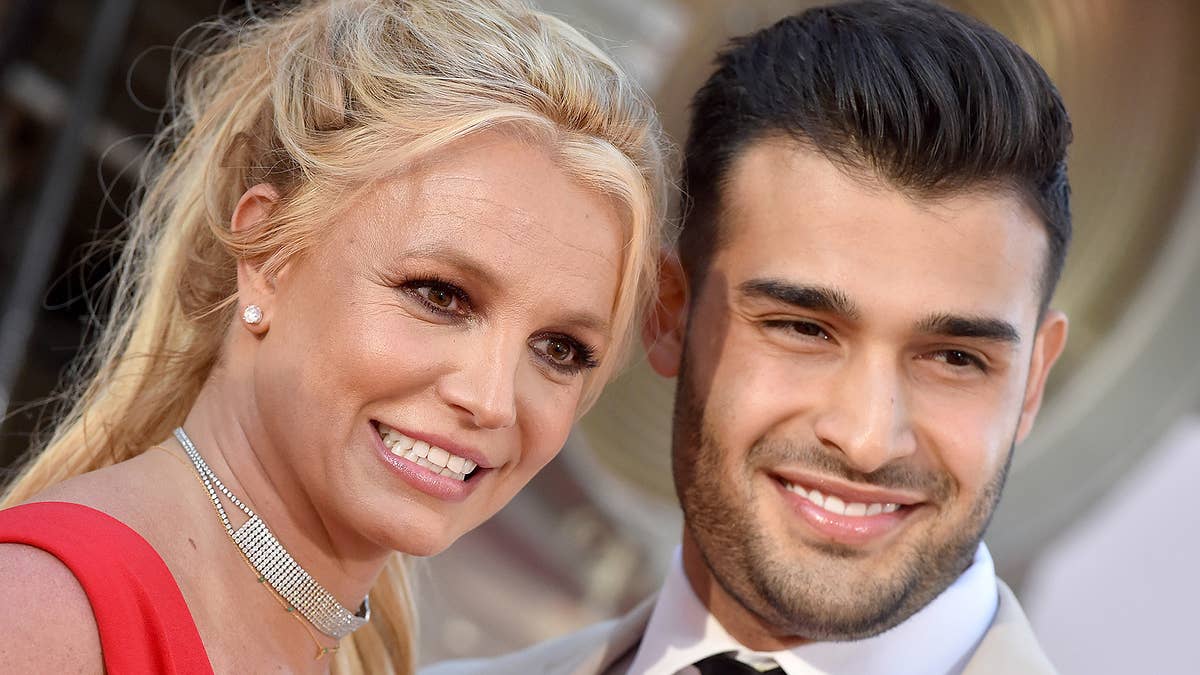 Amid speculation their marriage is in trouble, Britney Spears shared a video of her kissing husband Sam Asghari.