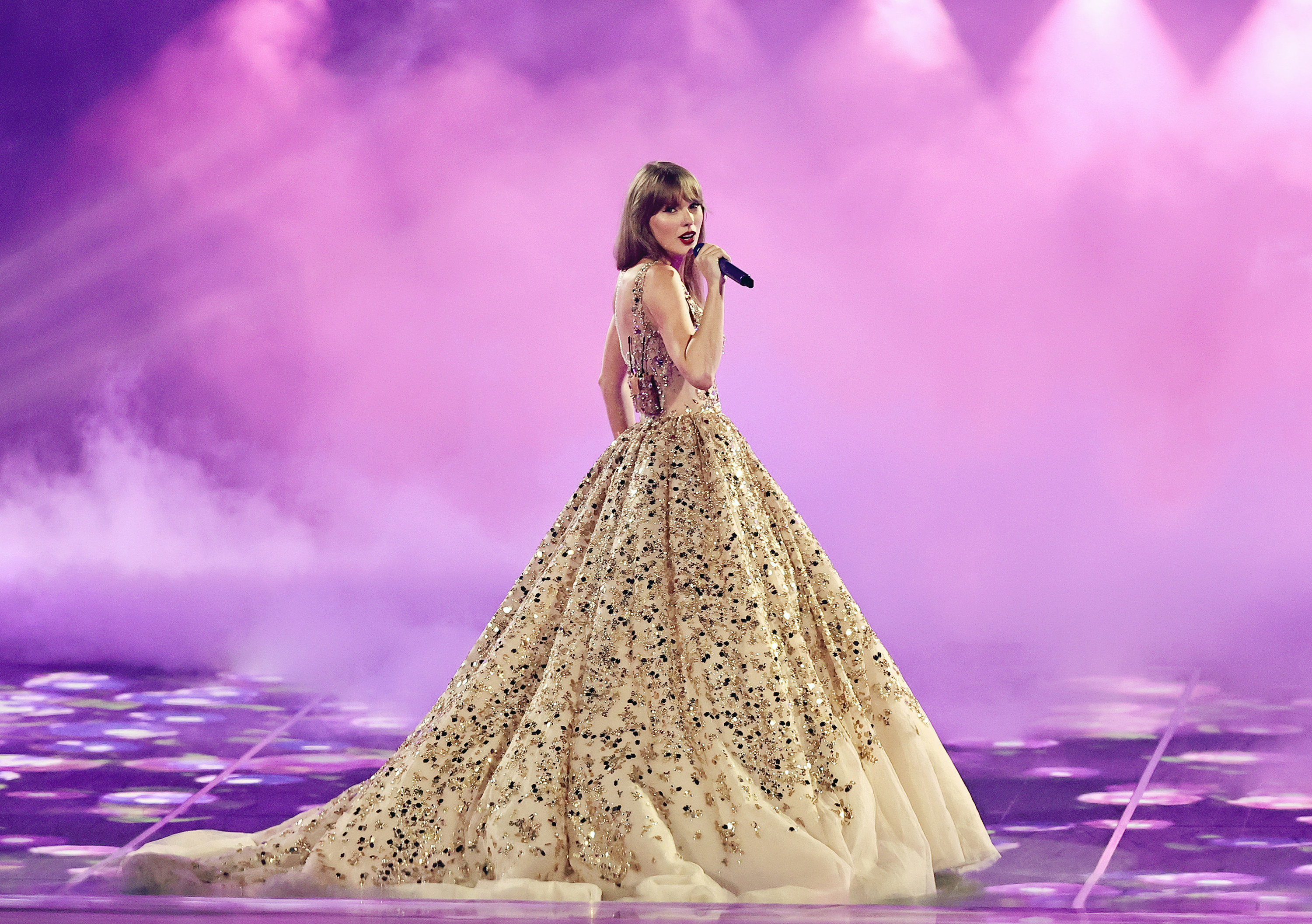 Taylor Swift wearing a shimmering ball gown
