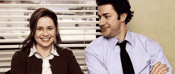 Pam and Jim smiling at one another in &quot;The Office.&quot;