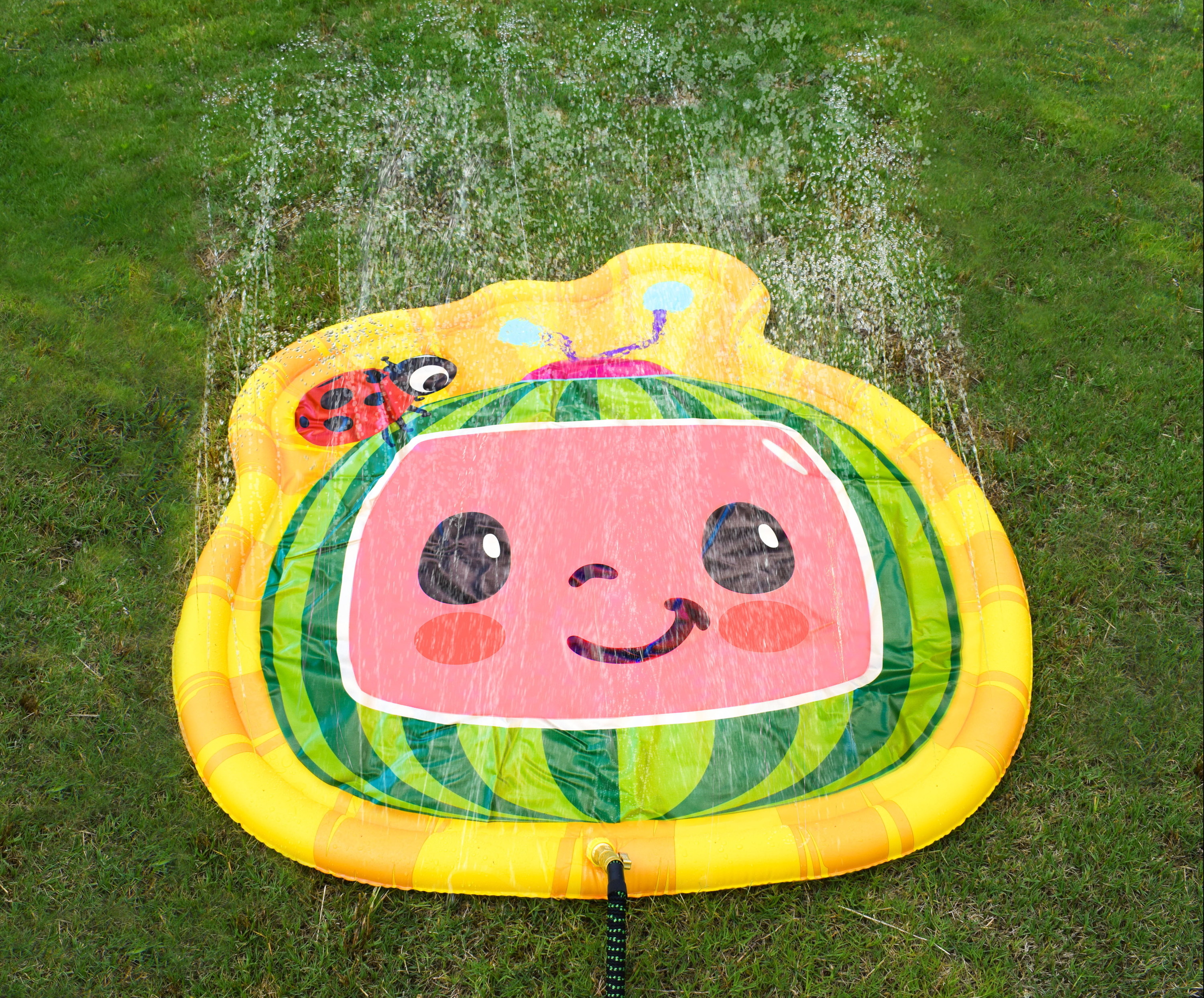 the cocomelon splashpad with the water on