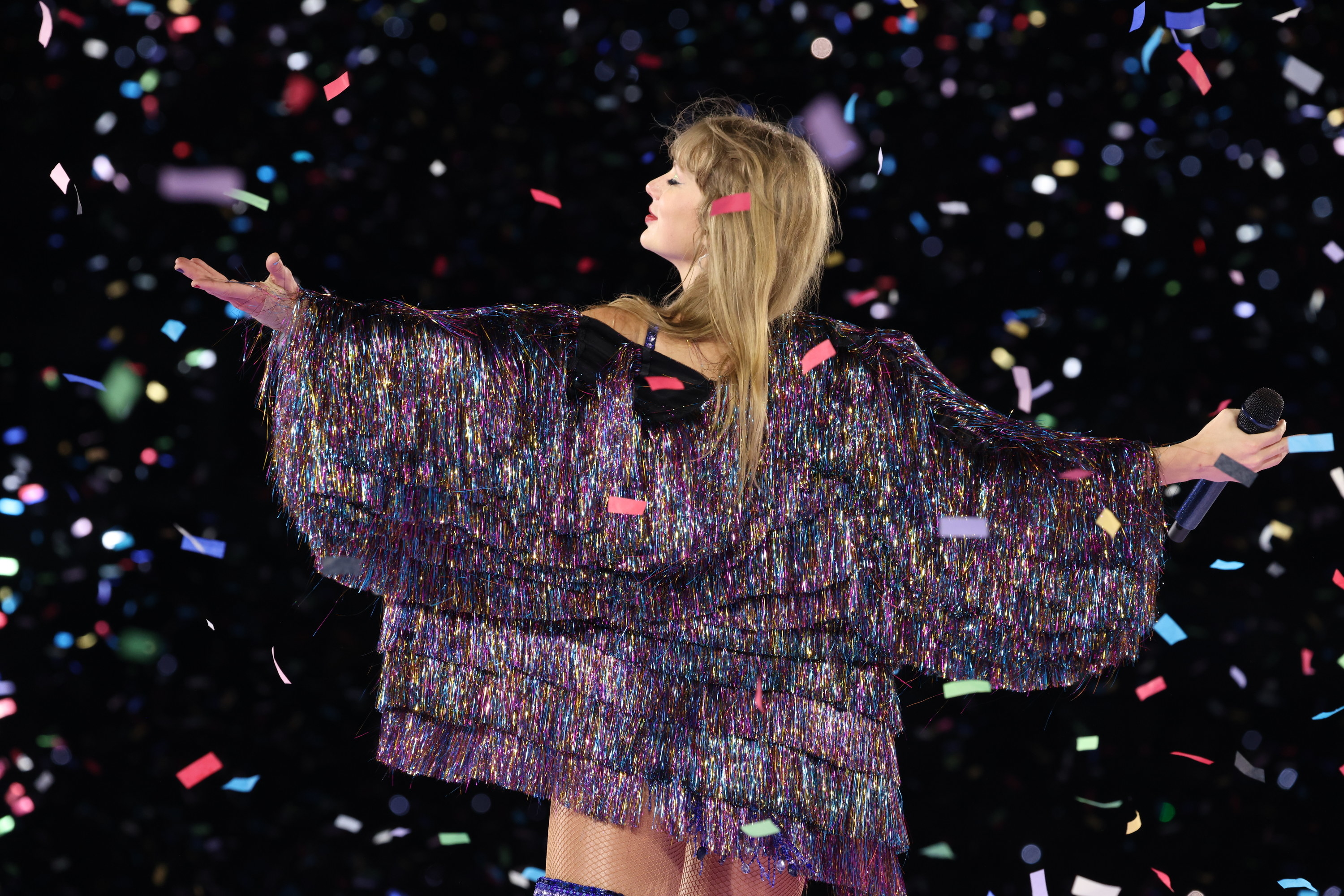 Taylor Swift wearing a glittery tassel jacket