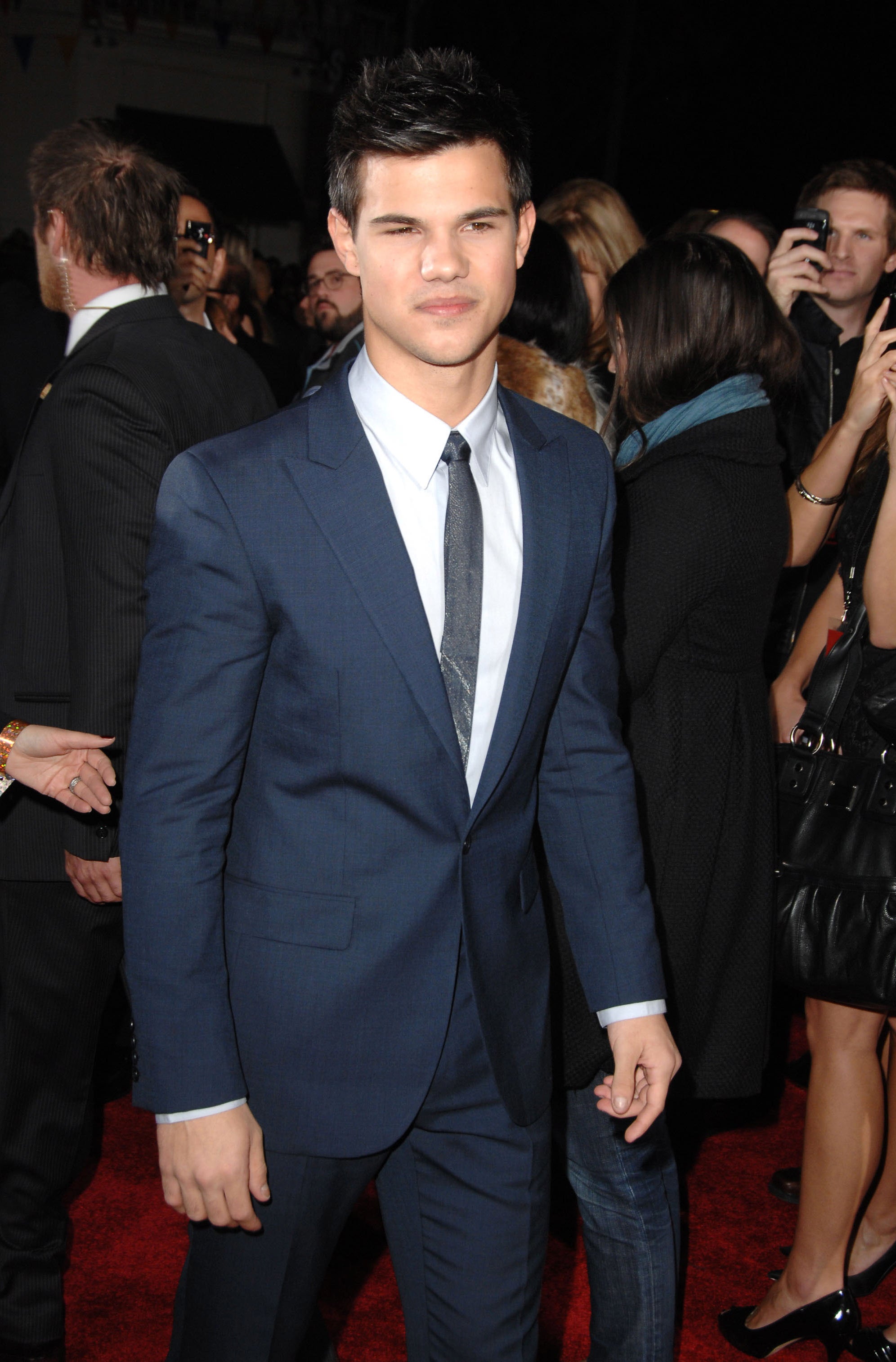 Tyler in a suit and tie on the red carpet