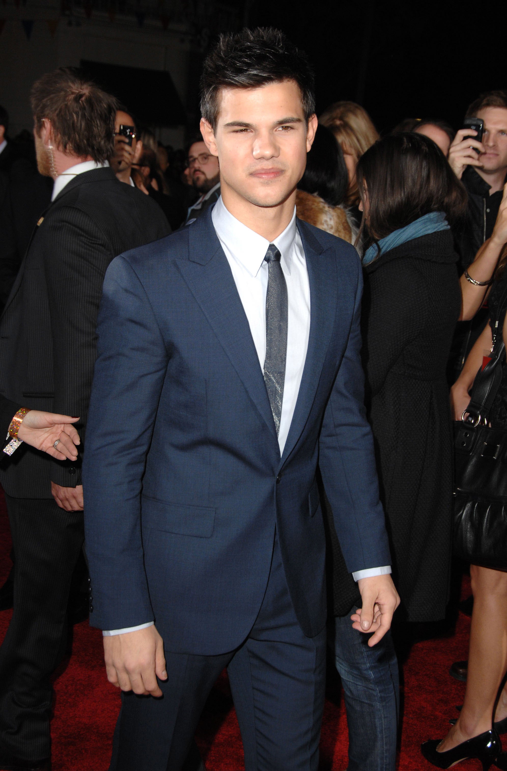 Tyler in a suit and tie on the red carpet