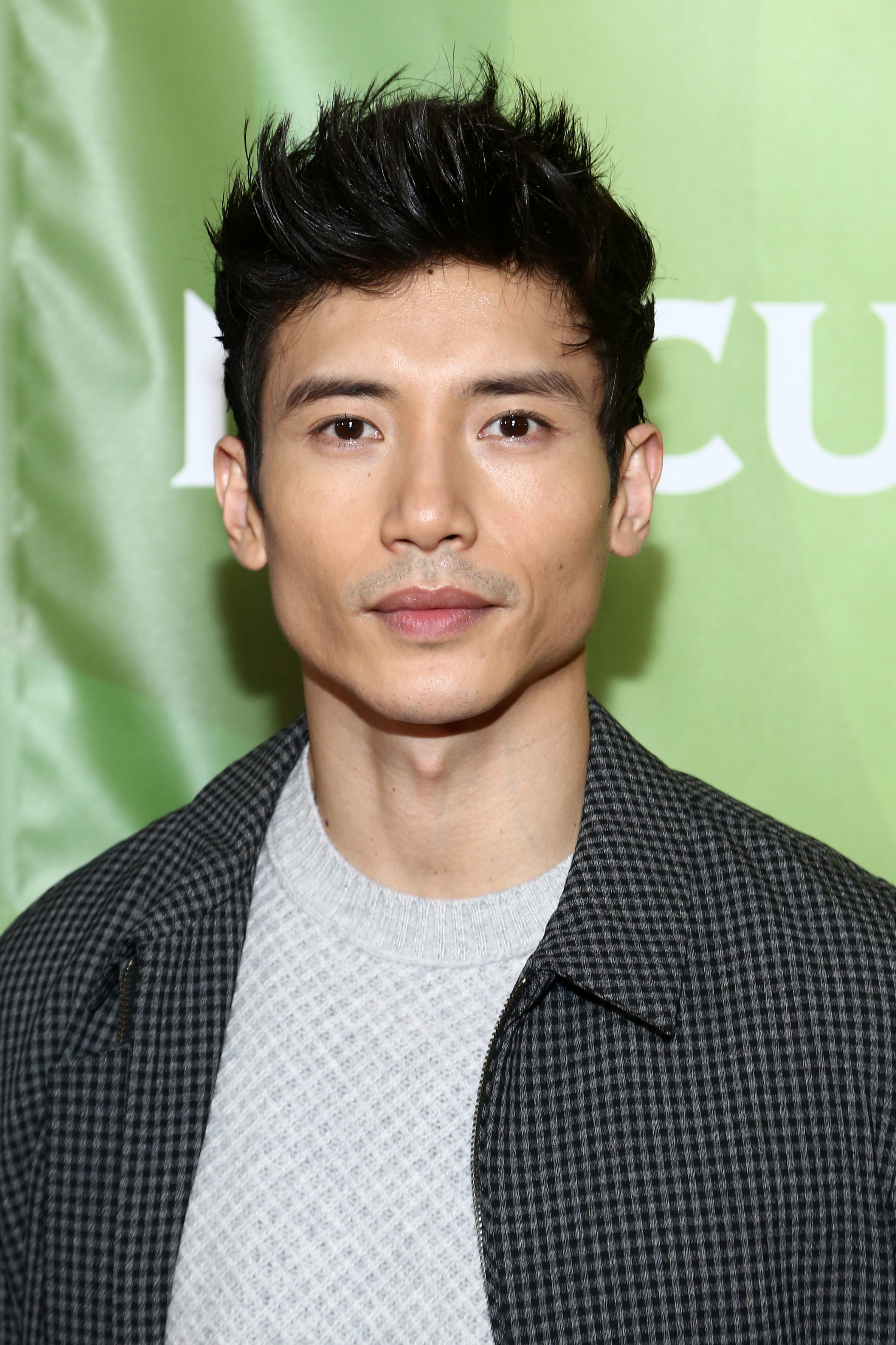 Manny Jacinto on the red carpet