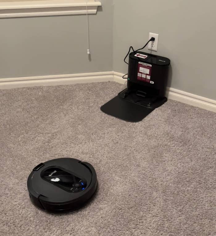 The vacuum on carpet heading out from charging base