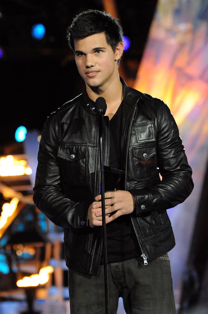 Taylor Lautner speaking onstage