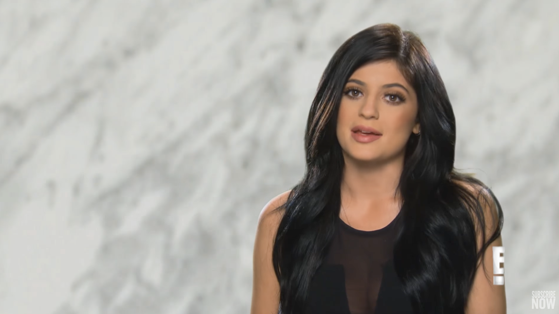 An interview shot of Kylie on &#x27;Keeping Up&#x27; speaking to the camera in front of a marble background