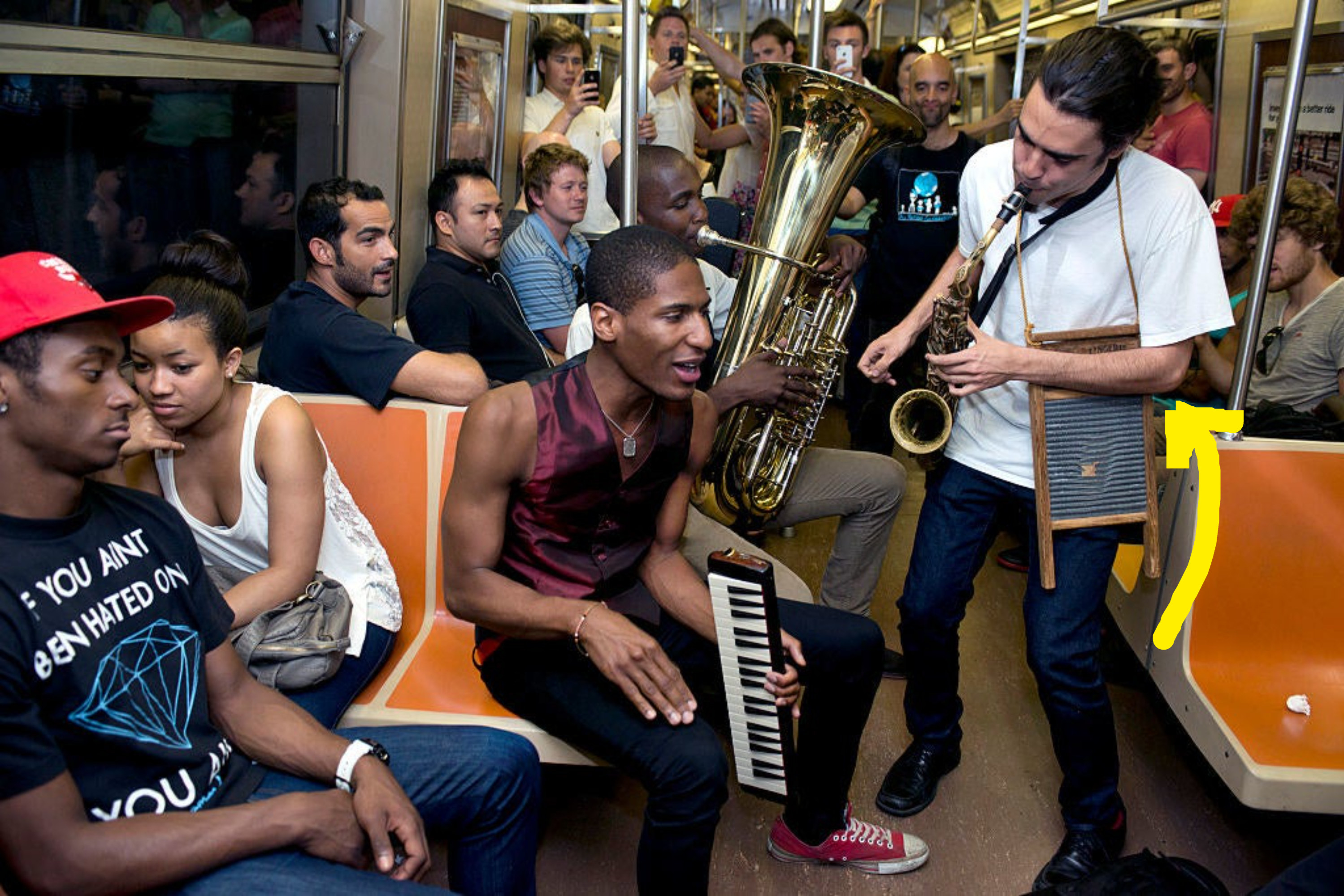 People playing music in a New York subway car