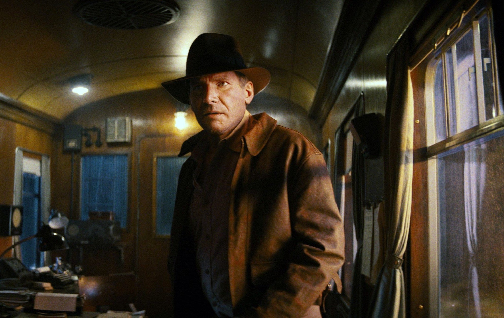 A de-aged Indiana Jones wearing his iconic hat