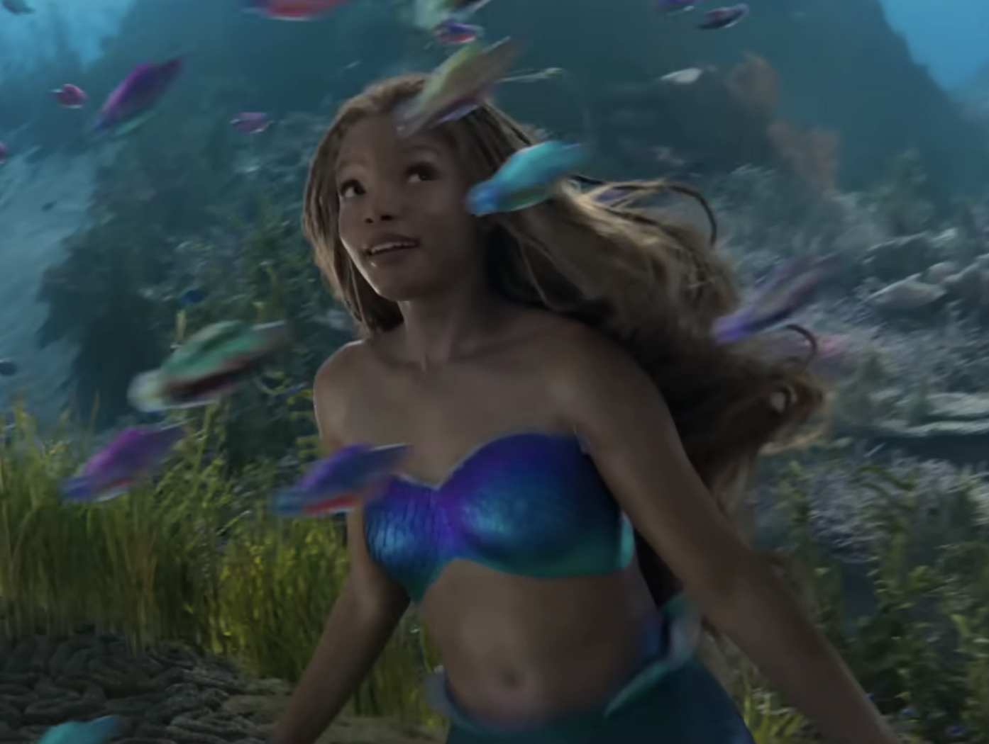 halle as ariel swimming with fish
