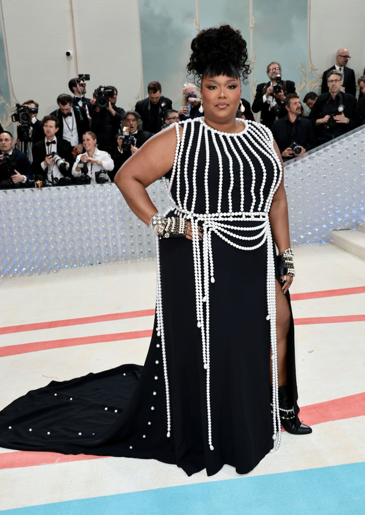 Lizzo attends The 2023 Met Gala in a beaded black gown