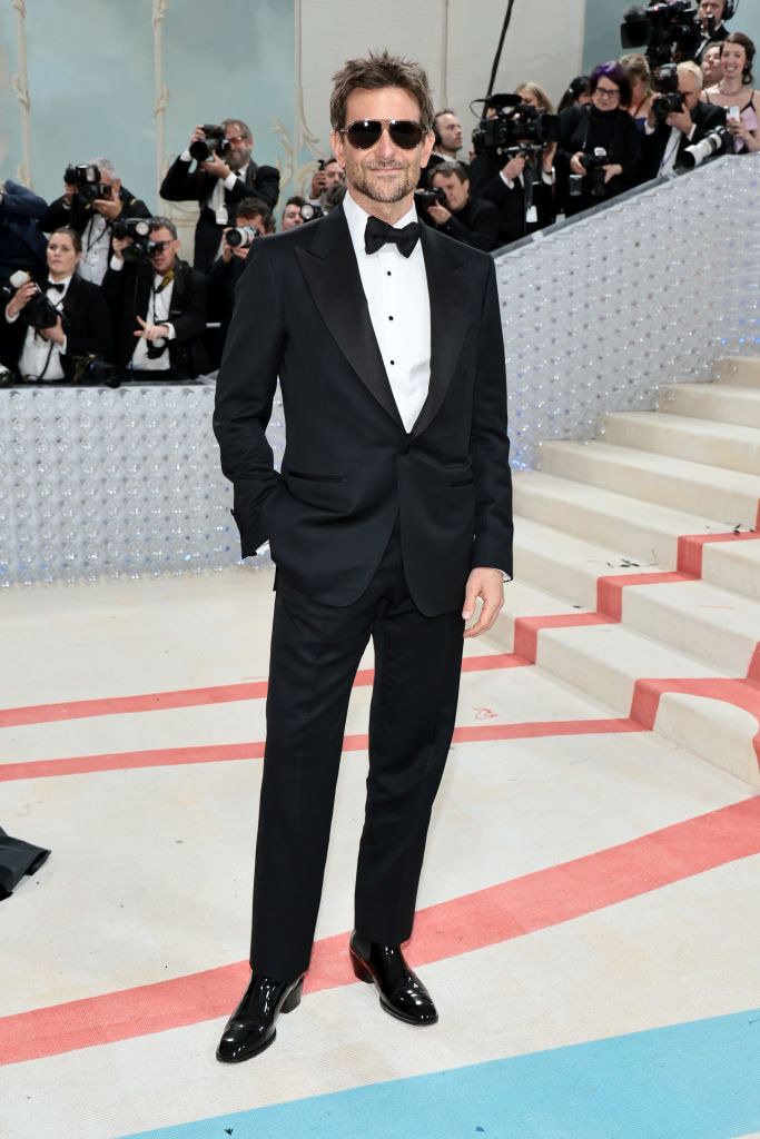 Bradley Cooper attends The 2023 Met Gala in a suit