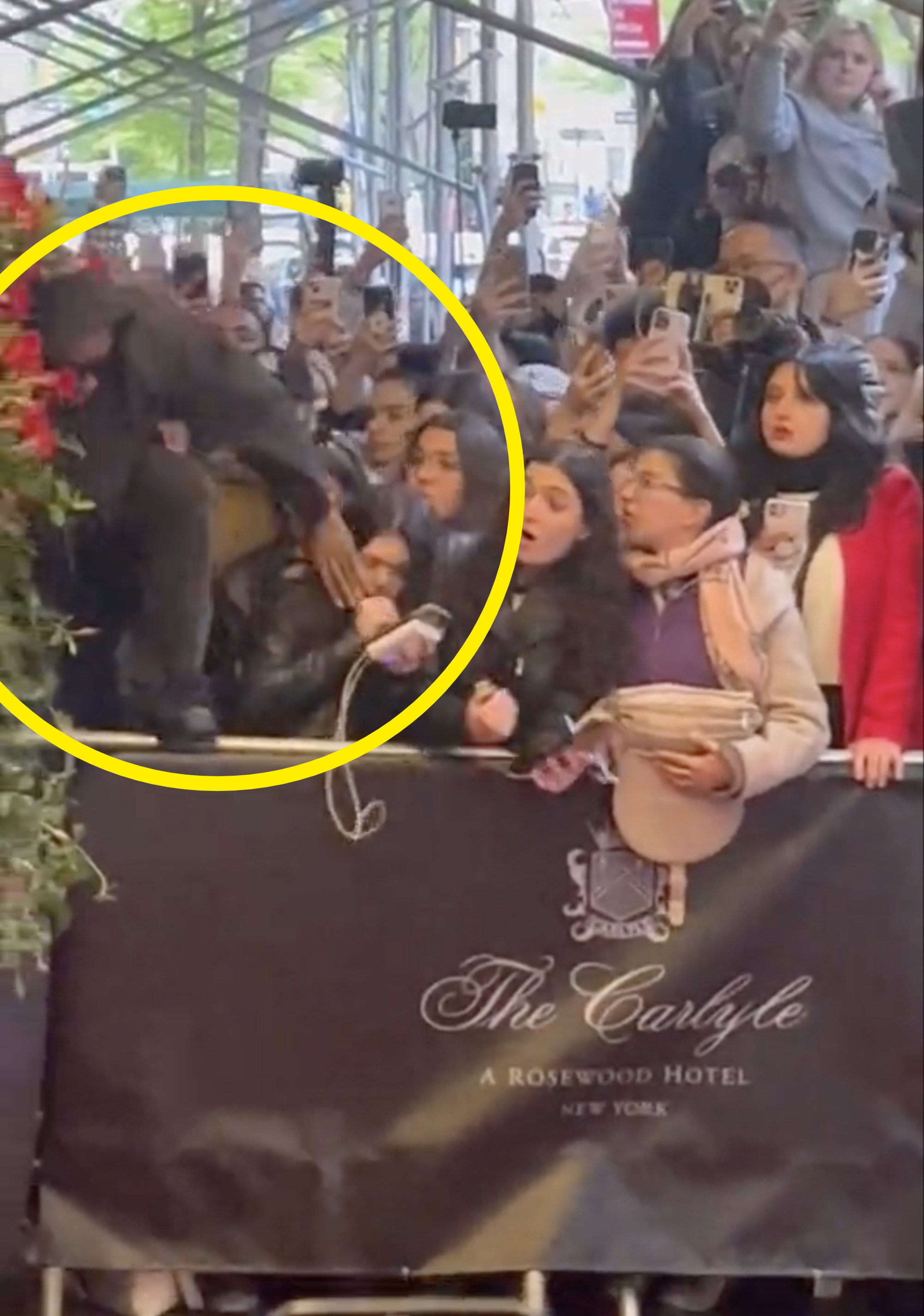 A$AP Rocky hopping a fence