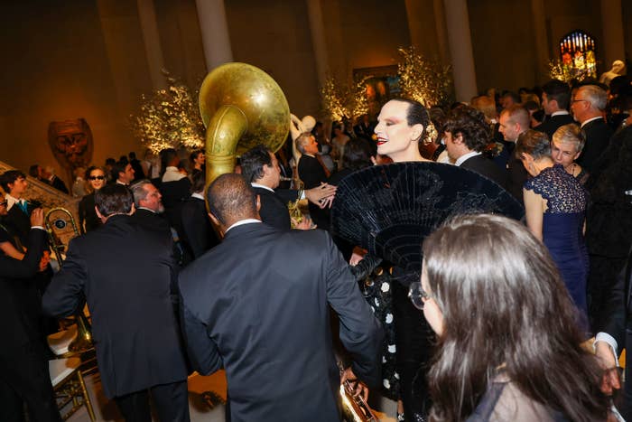 Met Gala guests mingling inside the museum