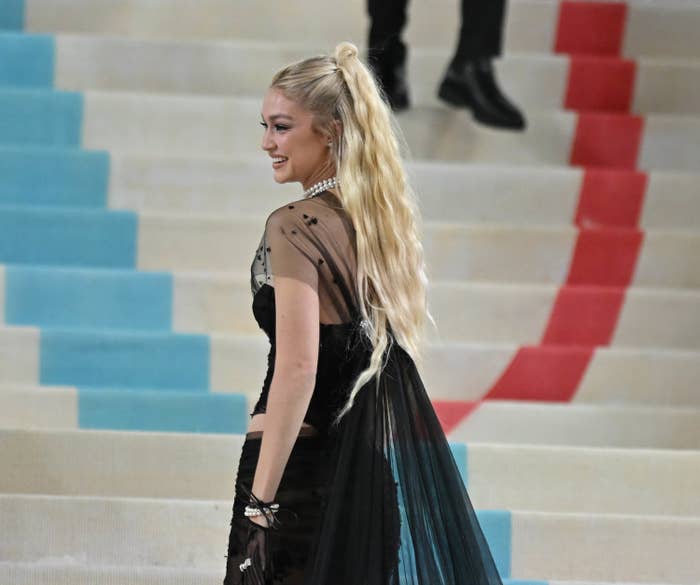 A guest walking up the steps at the Met Gala
