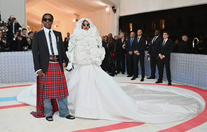 Rihanna and ASAP hold hands on the carpet