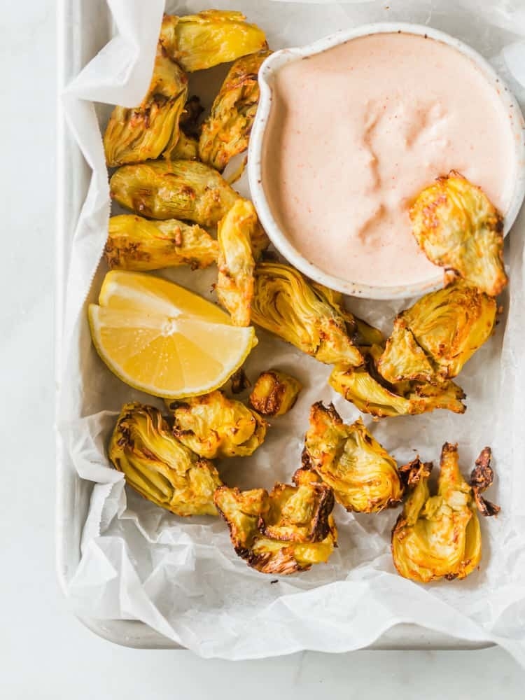 Air fryer artichoke hearts and aioli for dipping.