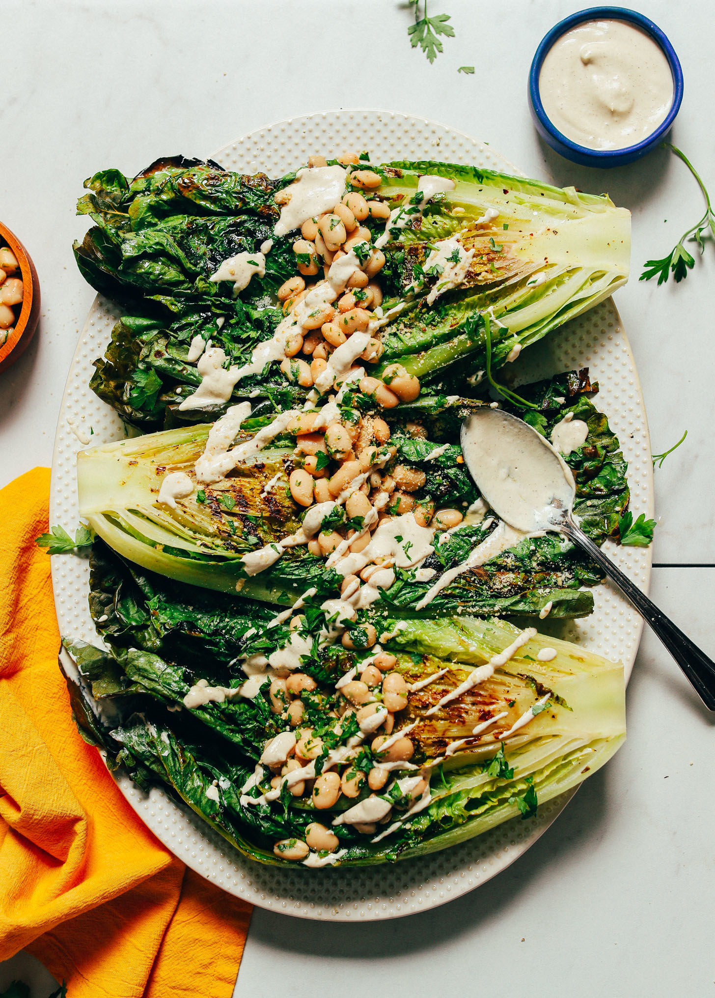 Grilled romaine salad with white beans.