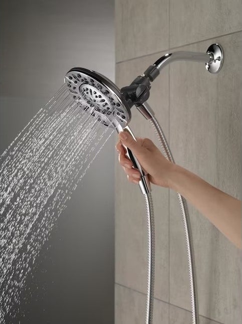 A silver and grey shower head
