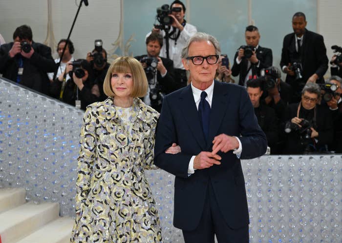 Anna and Bill pose together on the carpet