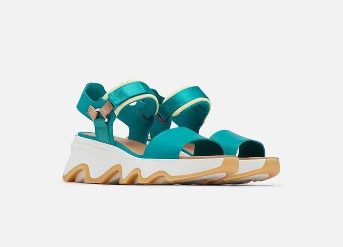 the white padded sandal with teal straps
