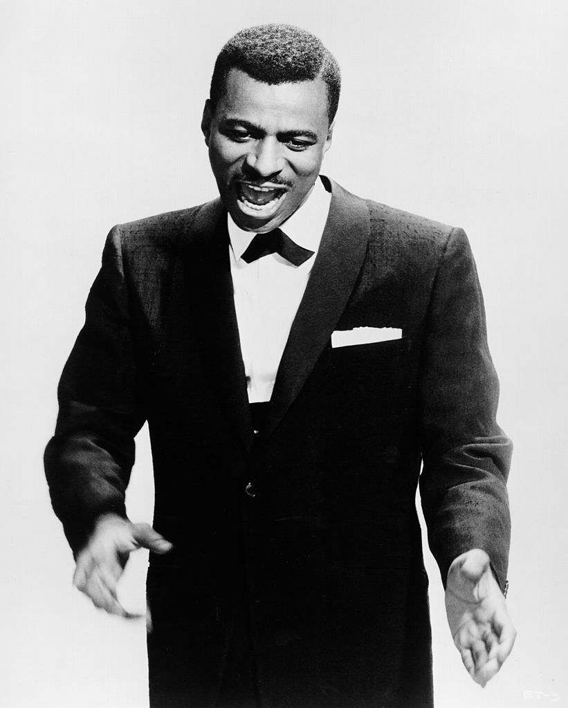 A black-and-white closeup of Ed Townsend in a tuxedo