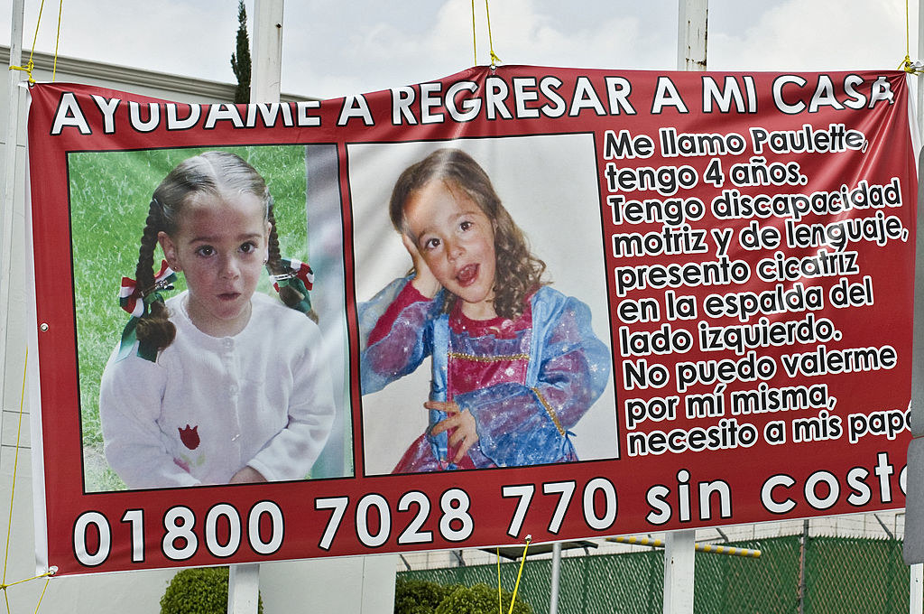 A billboard with information on four-year-old Paulette Gebara is seen on a street