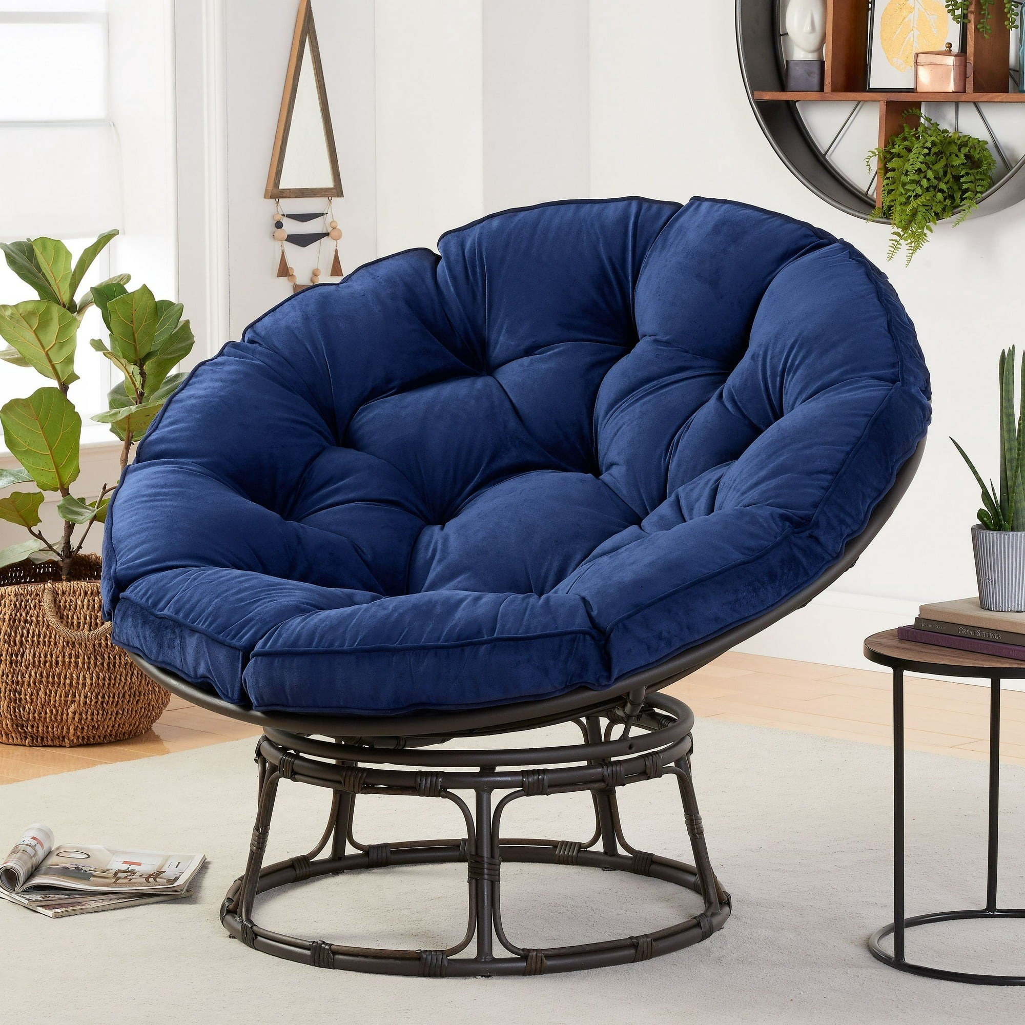 the circular chair with a tufted cushion in a bedroom