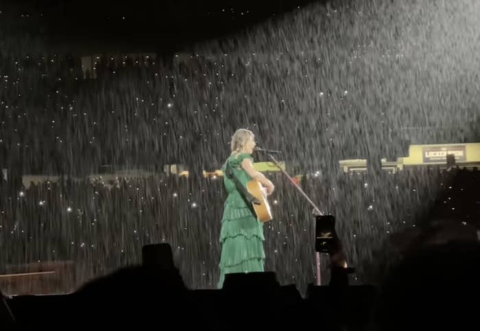 Taylor Swift performing in the rain