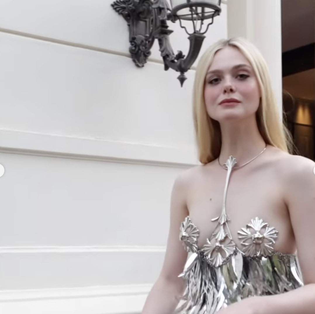 Elle Fanning Takes Paris in an Electric Silver Slipdress Covered in Sequins