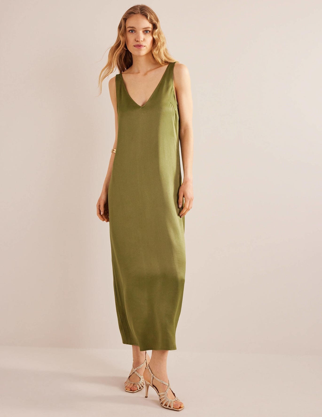 model in olive green v-neck tank sleeve maxi slip dress