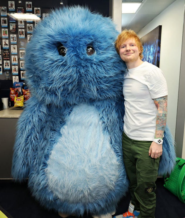 Ed Sheeran and a giant plush