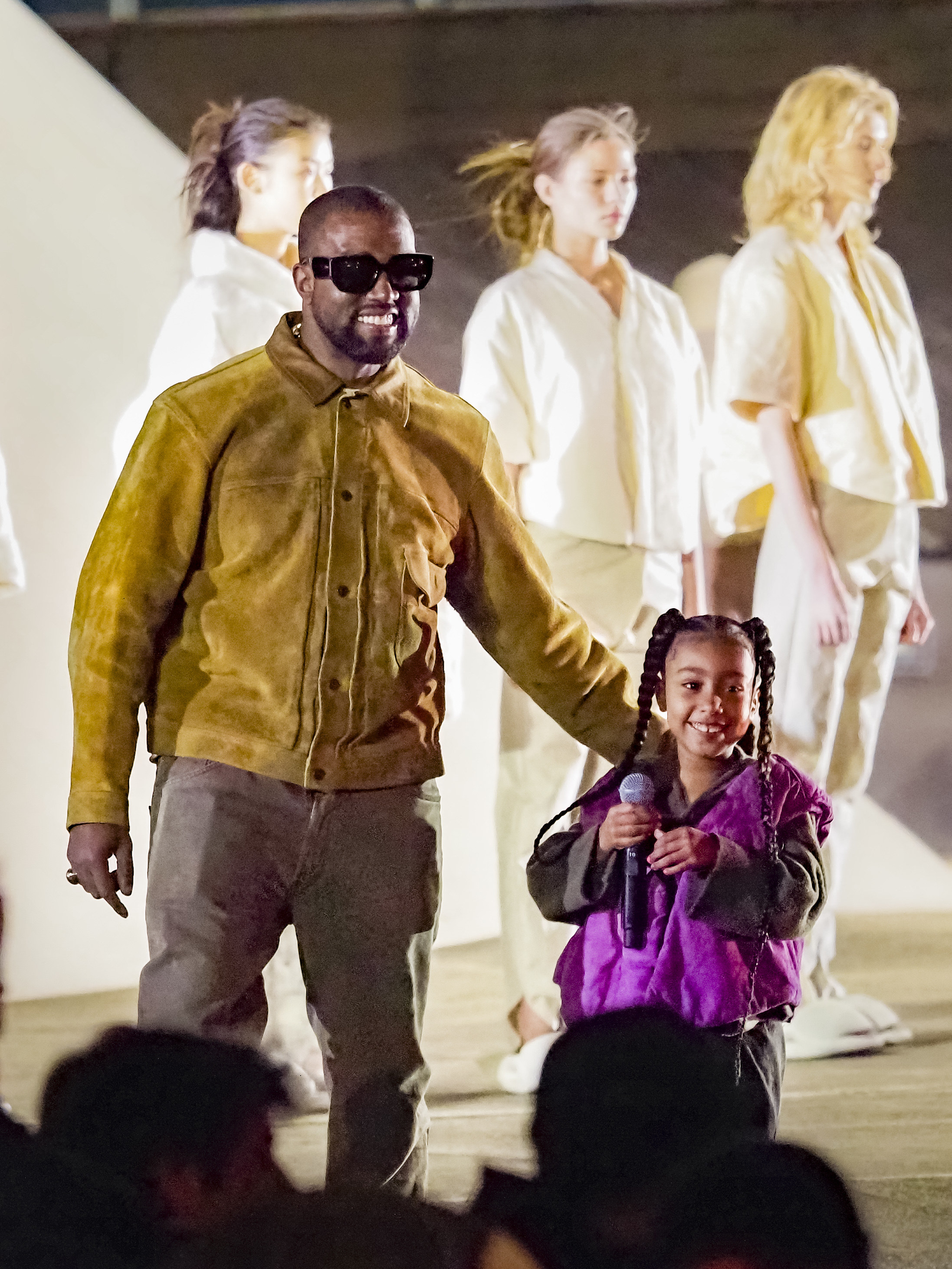 Ye with one of his children