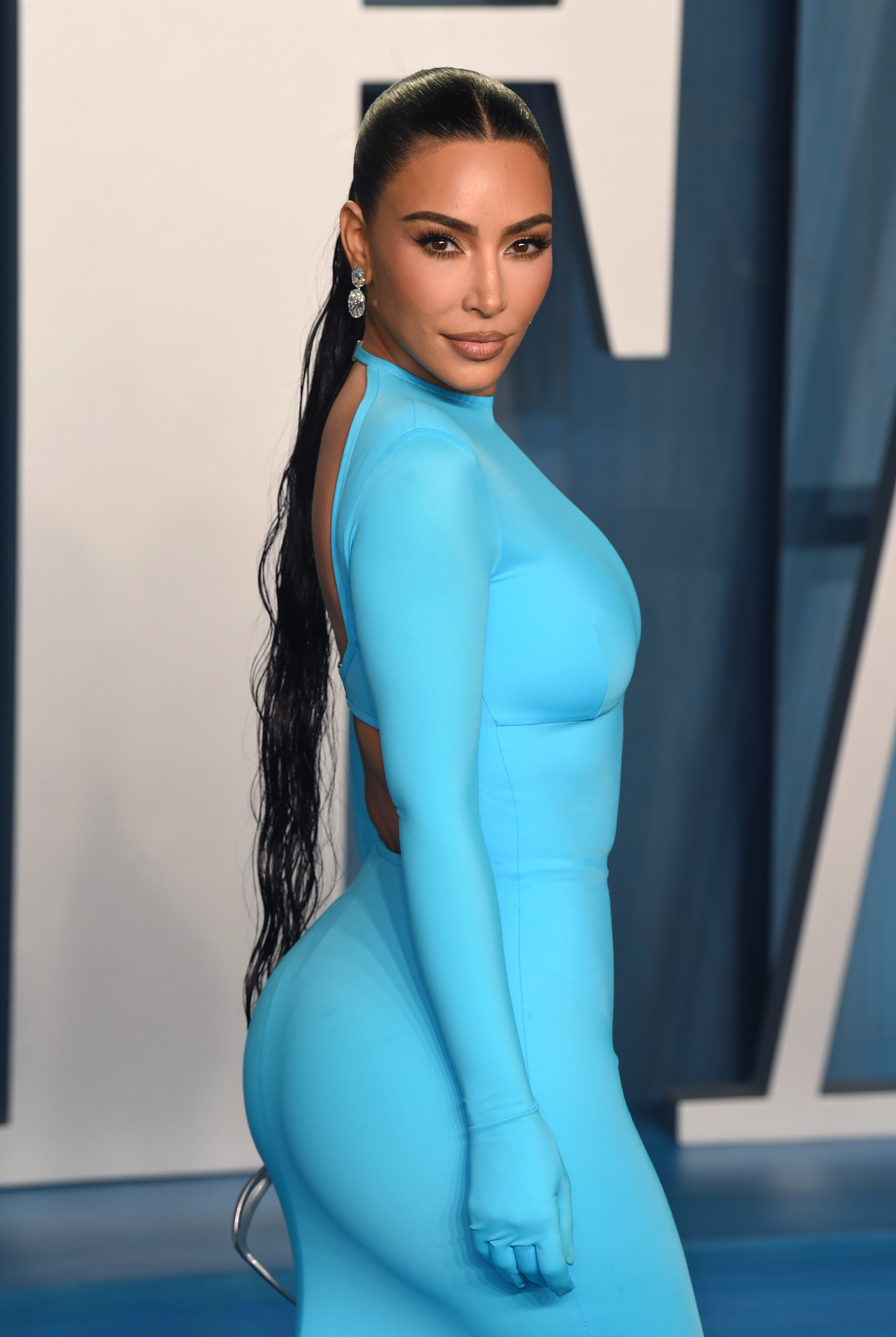 Kim in a bodycon outfit at a red carpet event