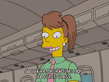Gif of a character from &quot;The Simpsons&quot; saying &quot;so we&#x27;re upgrading you to first class&quot;