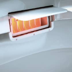 closeup of heat vent in toilet seat