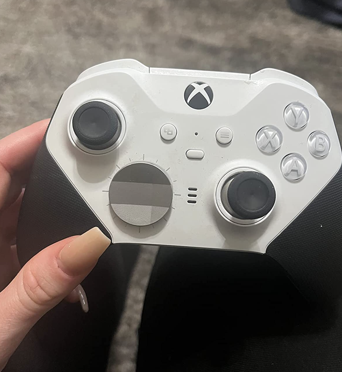 reviewer holding the controller