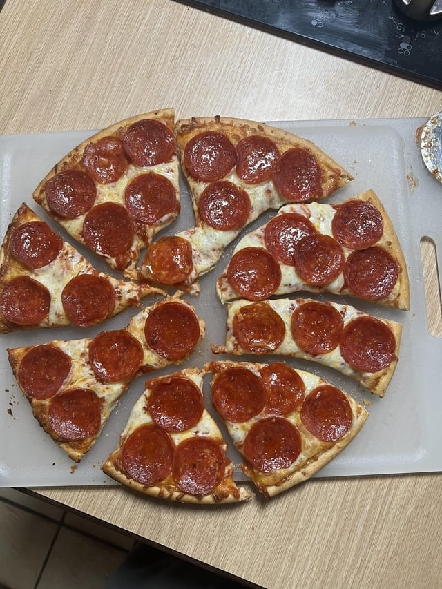 A badly cut pizza